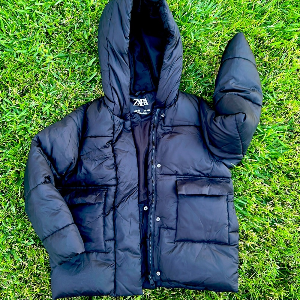 Black jacket can be for girl , with attached hat size 10 used just one winter